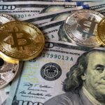 bitcoin coins dollar bills